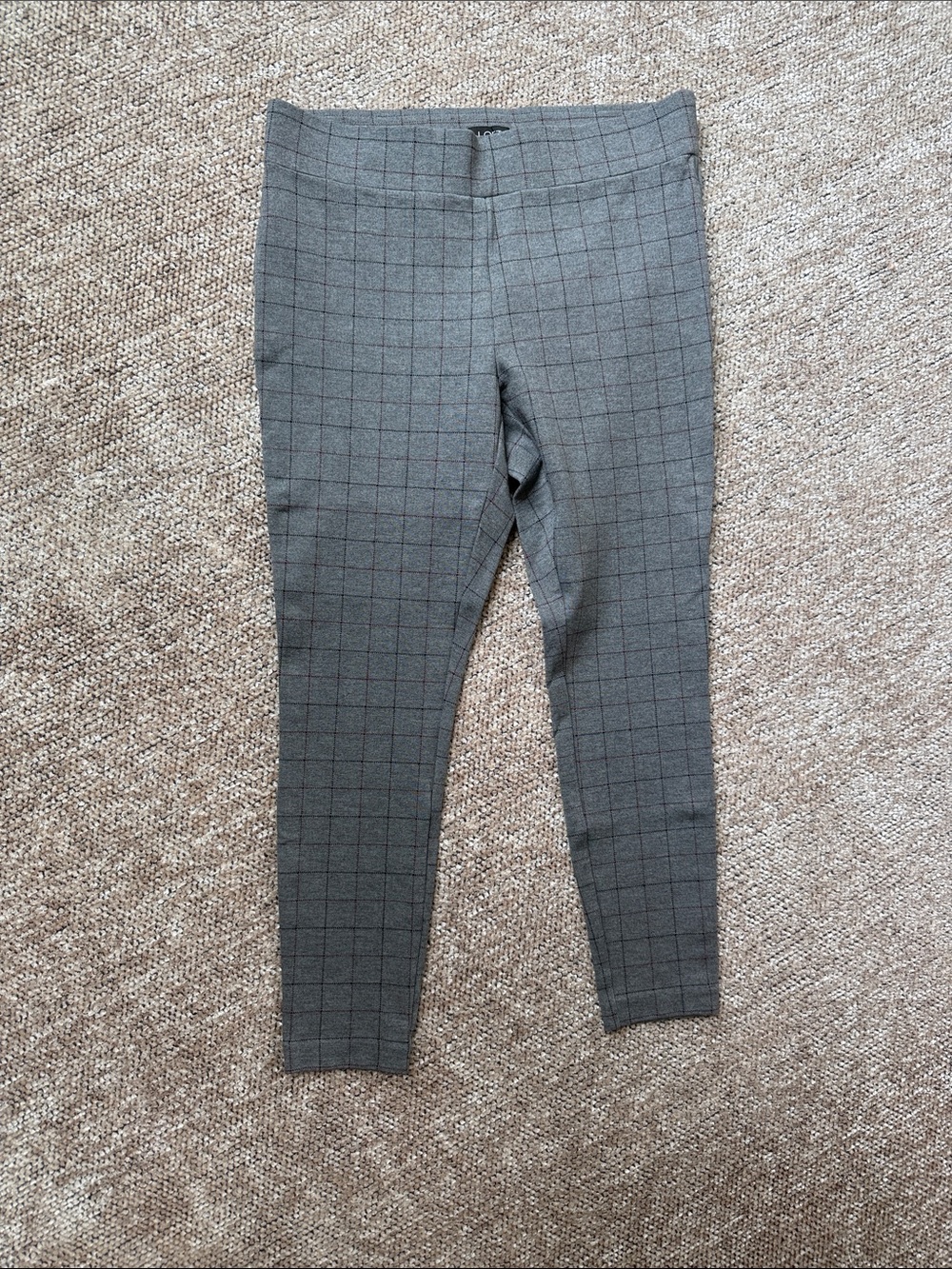 Women's grey plaid skinny ankle dress pants featuring a pull-on design